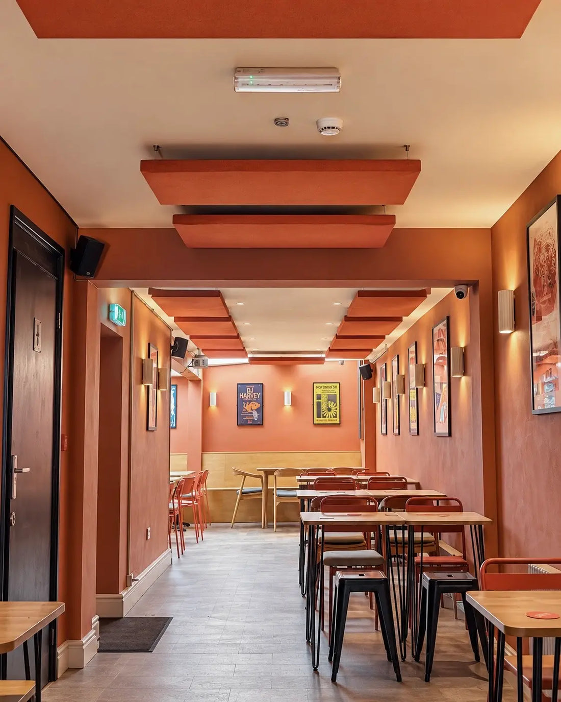 Restaurant with suspended acoustic ceiling panels